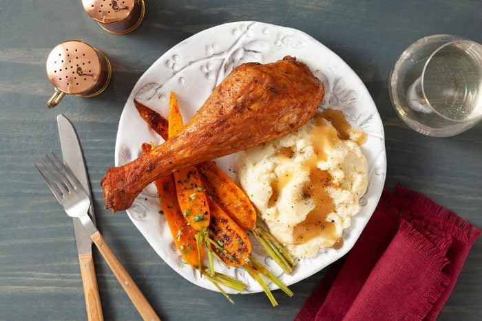 Grilled Turkey Drumsticks served with Mashed Potatoes and Grilled Pepper