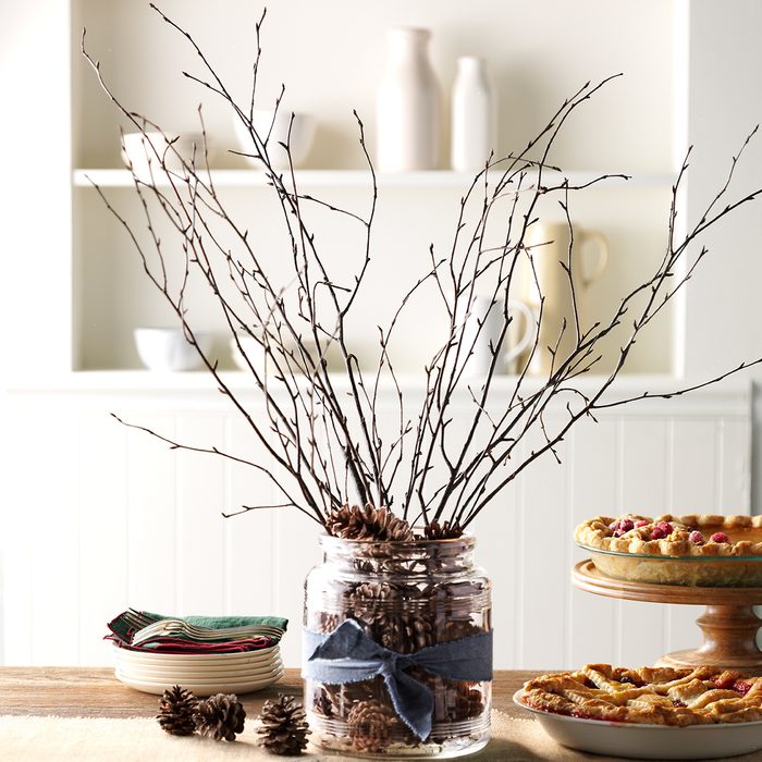 Sticks And Cones Centerpiece Country Woman