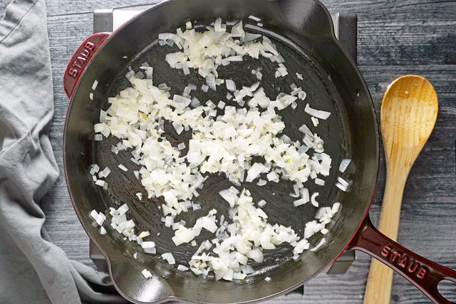 sauteing onions in a skillet