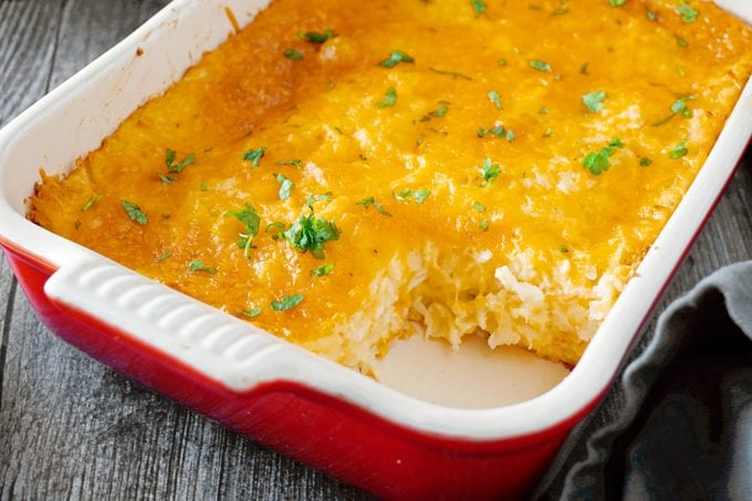 Copycat Cracker Barrel Potatoes in a pan with a section cut out