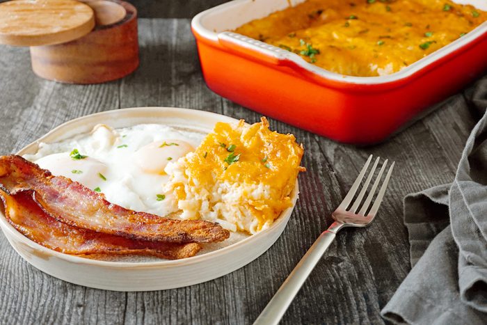 Copycat Cracker Barrel Potatoes plated with eggs and bacon
