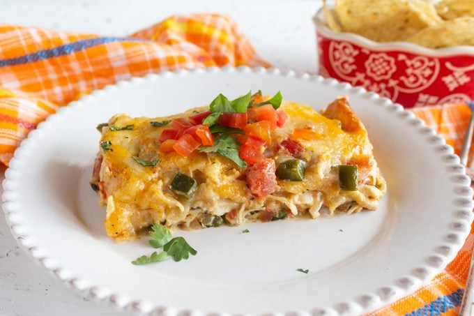 slice of the king ranch chicken casserole on a plate