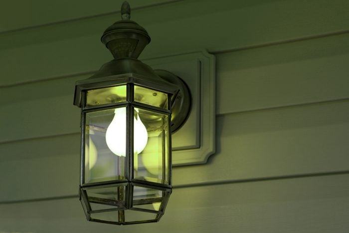 Green Porch Light outside of house