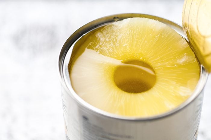 open can of pineapple close up
