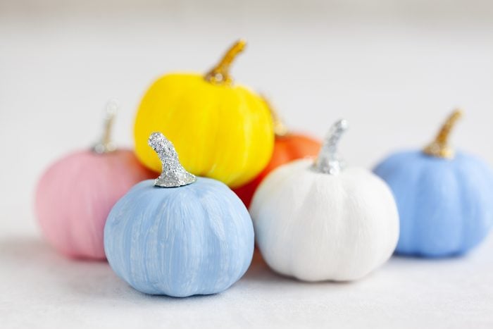 Bright halloween pumpkin colors on white background