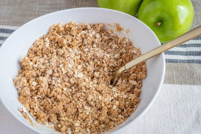 topping prep in a white bowl for pioneer woman's apple crisp recipe