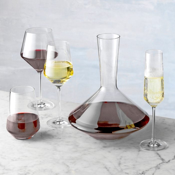 Wine decanter and glasses beautiful stemware spread on table