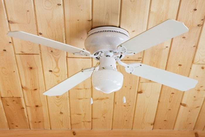 white ceiling fan on wood ceiling