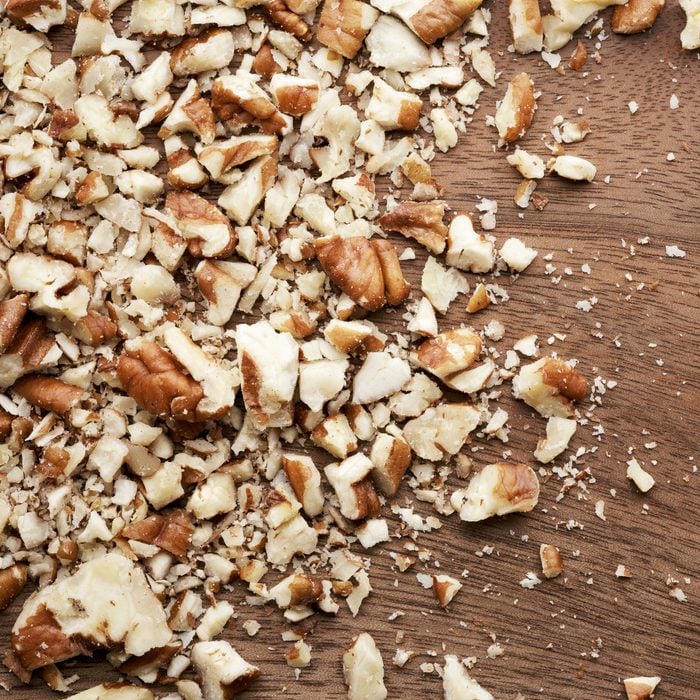 chopped nuts on wood surface