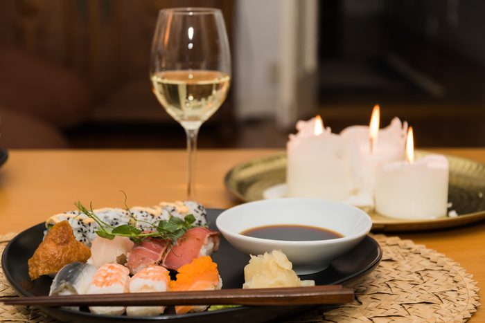 Sushi meal on a table with white riesling wine