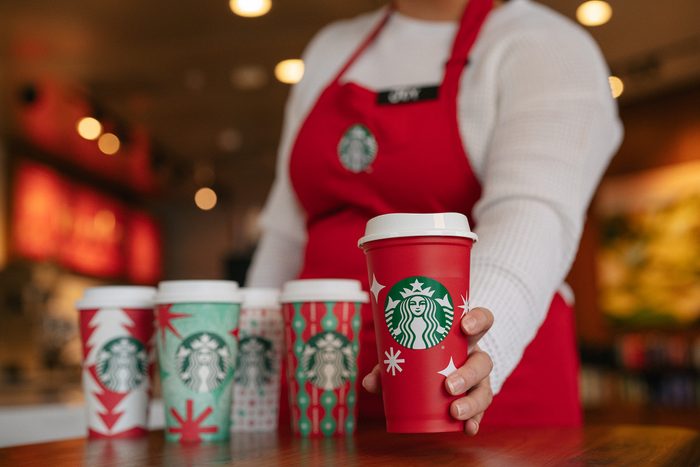 Assorted Starbucks Reusable Red Cup Full Lineup with Barista in background