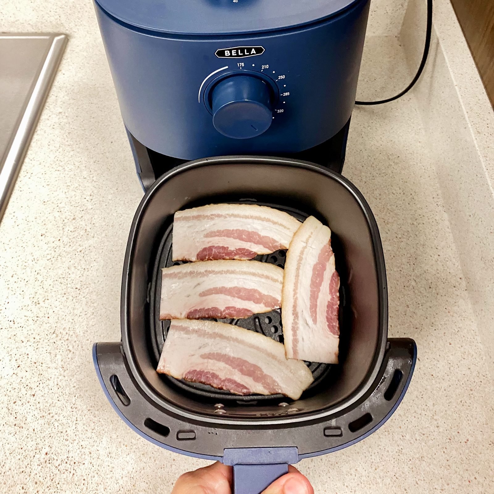 bacon cooking in Bella 2.9 Quart Air Fryer
