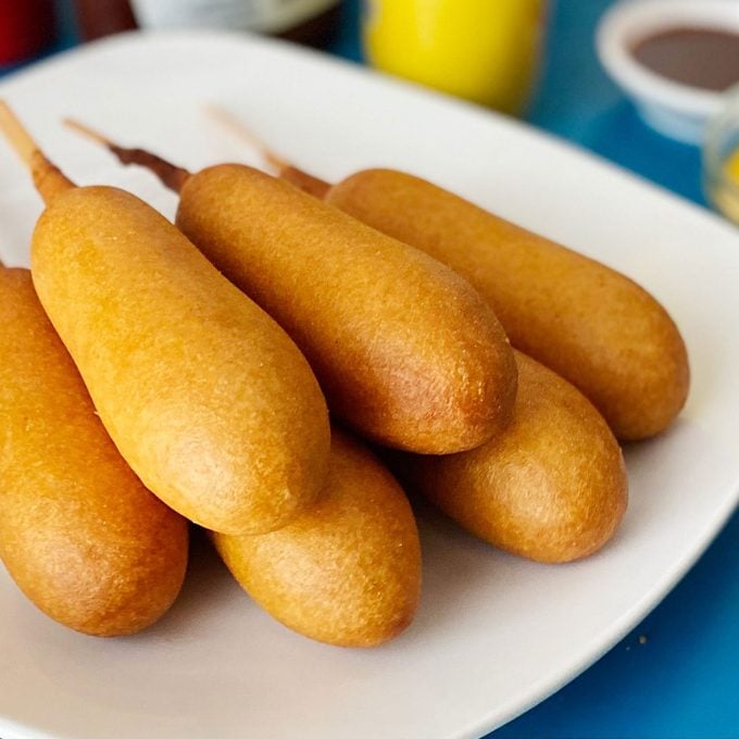 Air Fryer Corn Dogs on a white plate