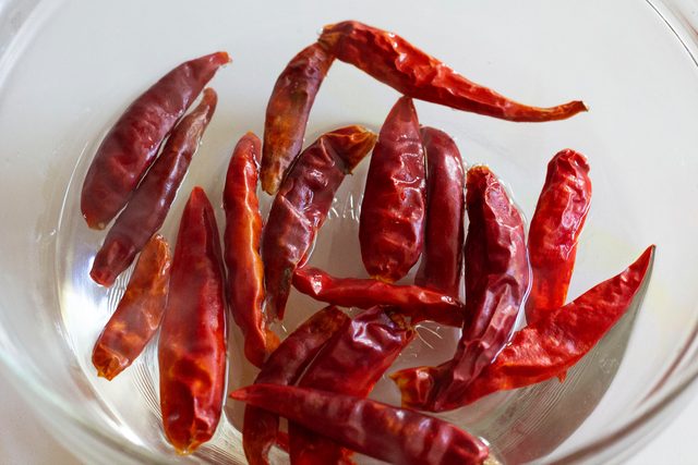 Soaking Red Chillies For Khao Soi