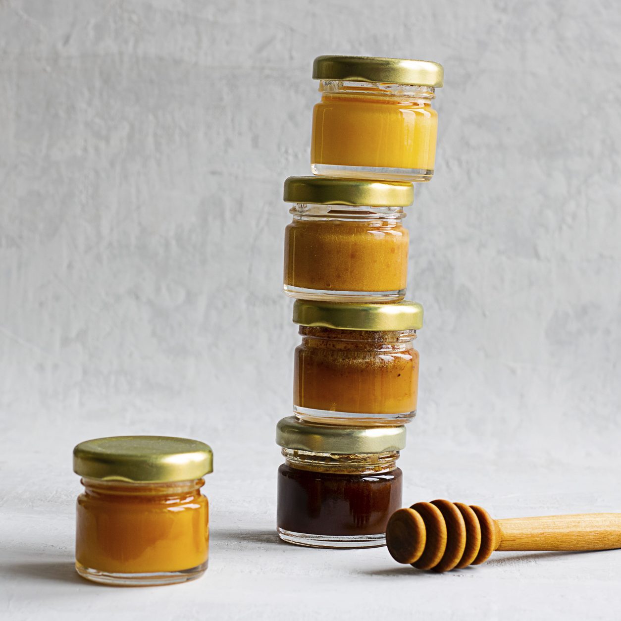 stacked mini jars filled with honey