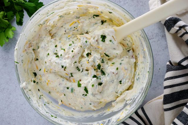 Adding Mix Ins to Loaded Hidden Valley Ranch Dip Mixture