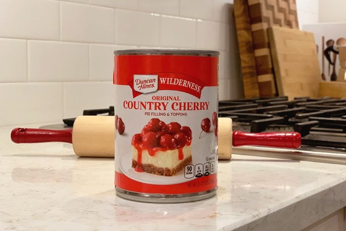 canned cherry pie filling on kitchen counter