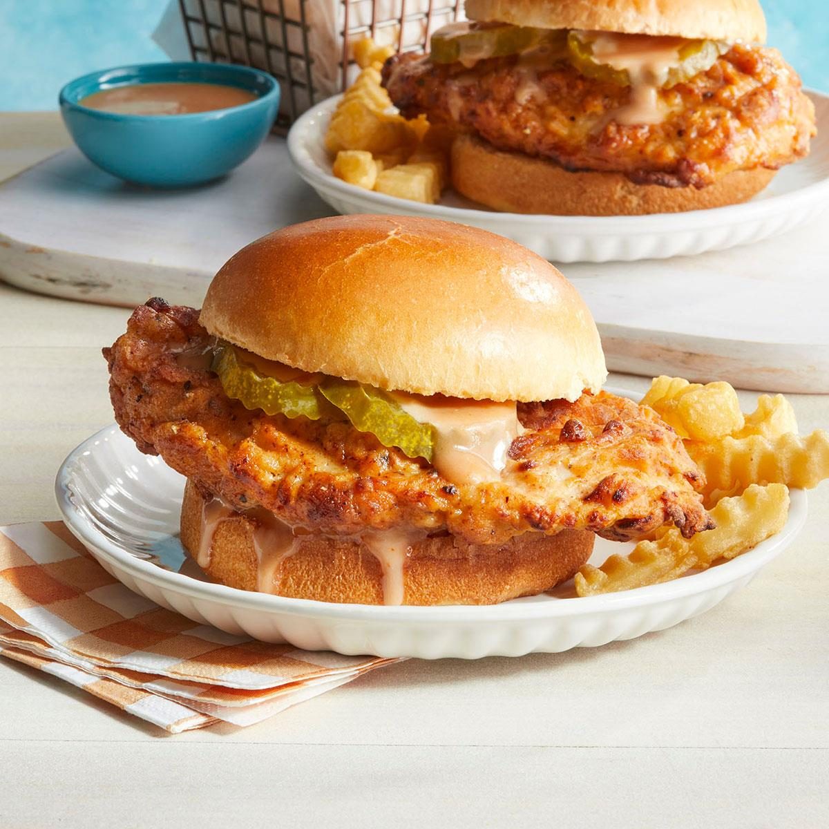 https://www.tasteofhome.com/wp-content/uploads/2022/01/Copycat-Fried-Chicken-Sandwich_EXPS_CCBZ24_265000_DR_10_17_3b.jpg?fit=700%2C1024