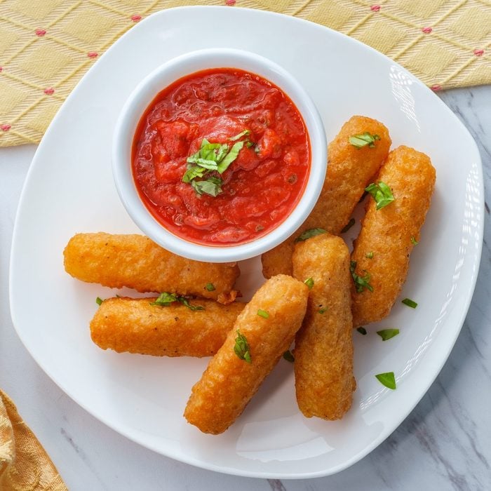 Mozzarella Cheese Sticks arranged on a plate after being air fried