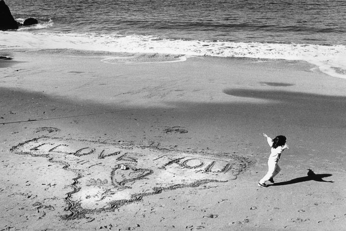 Isra Jacoby, 5 draws a valentine message in the sand at China Beach on Valentine's Day, February 14, 1988 Photo ran 02/15/1988, P. A3 (Photo by Brant Ward/San Francisco Chronicle via Getty Images)