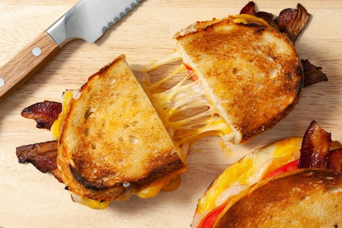 grilled cheese sandwich on a cutting board