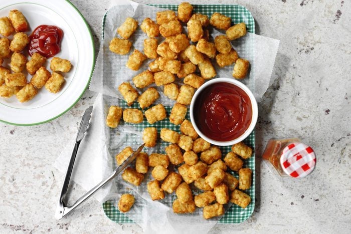 Prepared Tots a tray with a bowl of ketchup