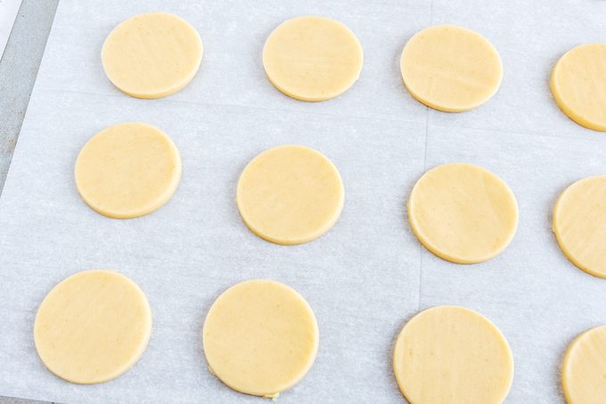 Tagalongs cut disks arranged on a baking sheet