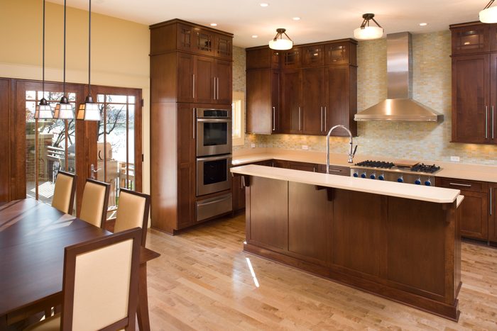 Modern residential kitchen with maple and stainless.