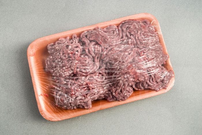 questionable Ground Beef in a package on a kitchen counter