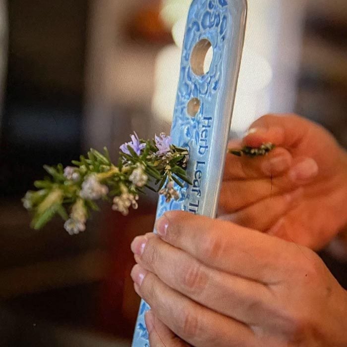 Ceramic Herb Leaf Stripper in use