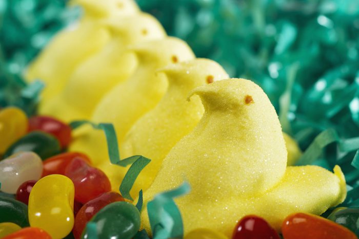 Marshmallow chicks in easter basket, side view, close-up