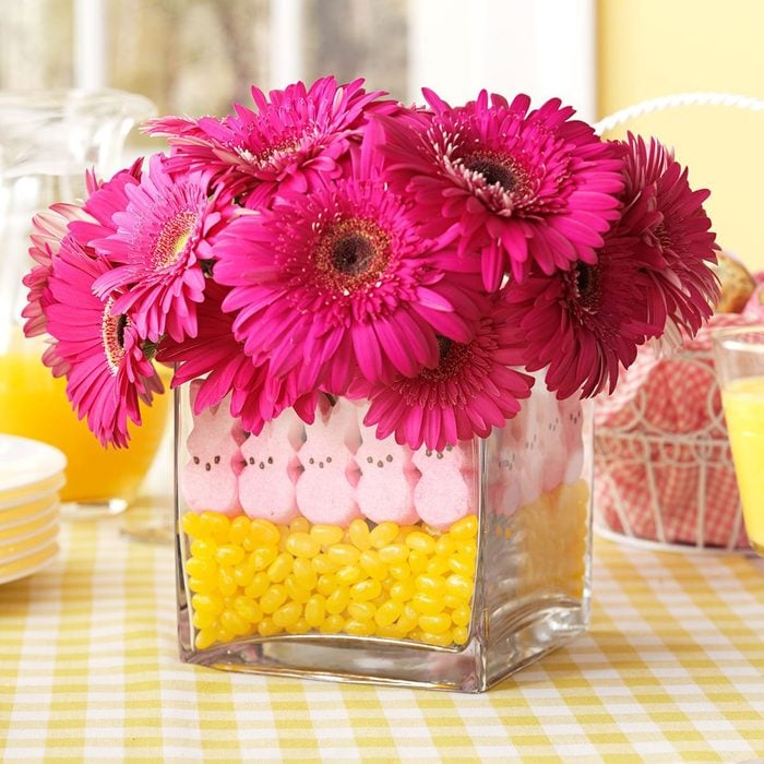 Flower vase for easter with peeps and candy in the bottom