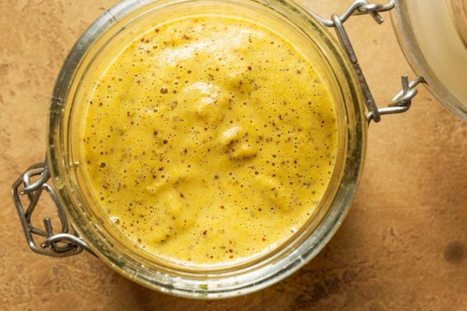 Dijon mustard in a jar, view from above