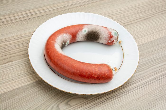 unhealty mead sausage with mold, fungus, stock photo