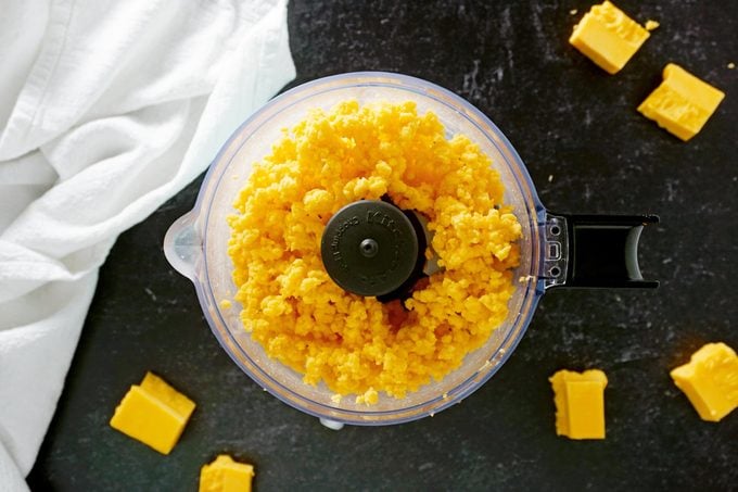 Chopping Cheese in a food processor for Homemade Cheez Its