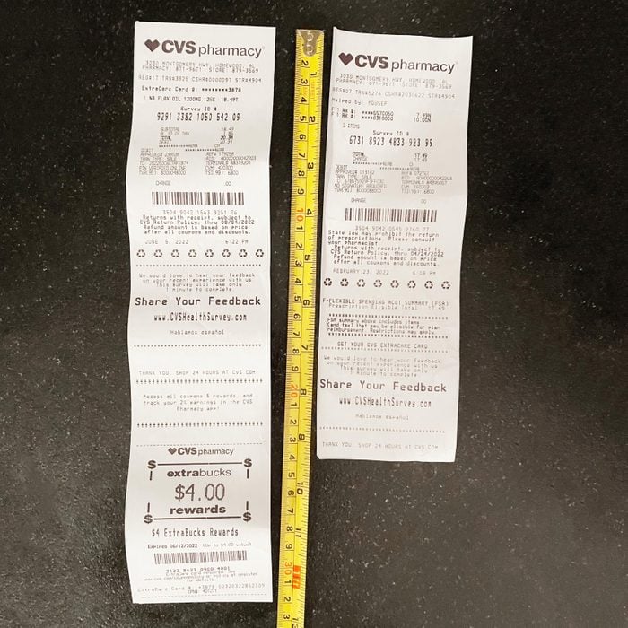 cvs receipts next to a tape measure