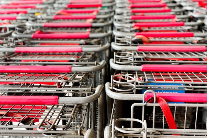rows of parked grocery shopping carts