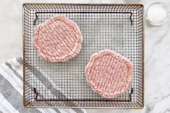 Frozen Hamburger Patties On Air Fryer Basket