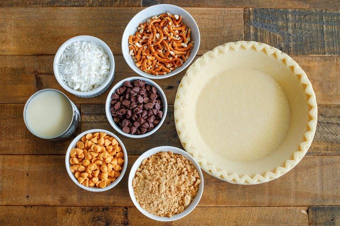 Texas Trash Pie ingredients laid out on a wood surface kitchen counter