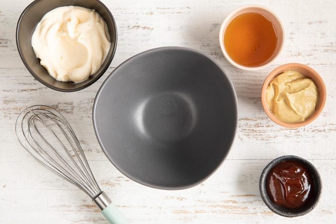 measured out ingredients for chick fil a sauce in separate bowls