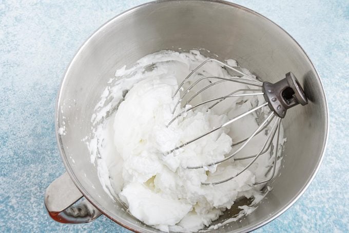 making magic cake in a metal stand up mixer