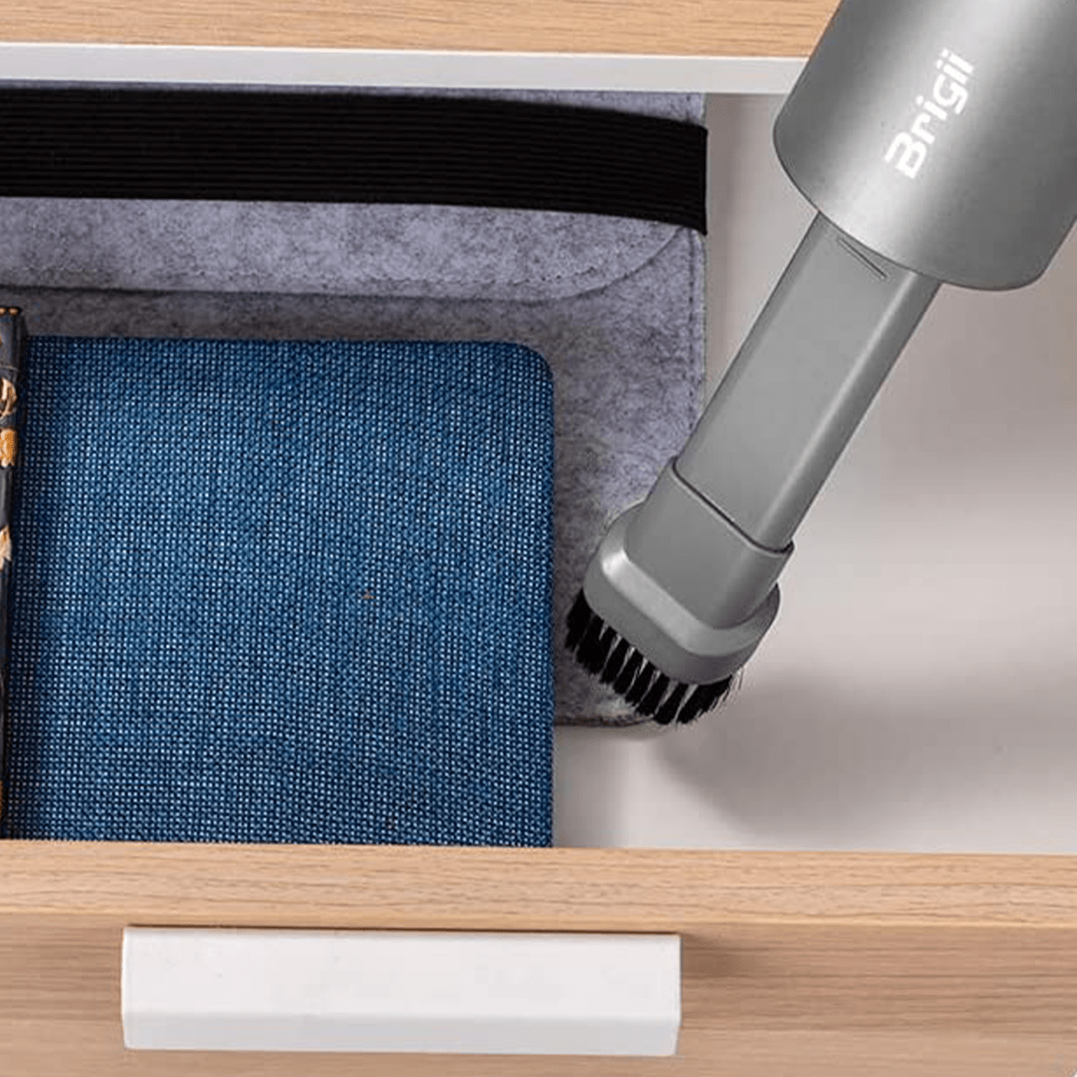 This Mini Vacuum On Amazon Is a Game Changer for Dirty Cabinets