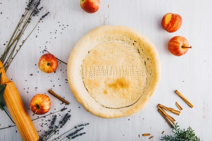 Preparing a pie crust by blind baking the crust first