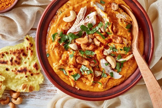 fragrant Indian Mulligatawny Soup is spiced with curry and made from creamy red lentils, carrots, apples and coconut milk