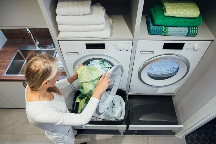 woman Doing towel Laundry