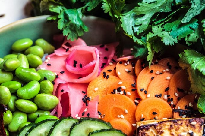 pickled edamame, ginger, carrots and cucumbers topped with sesame seeds