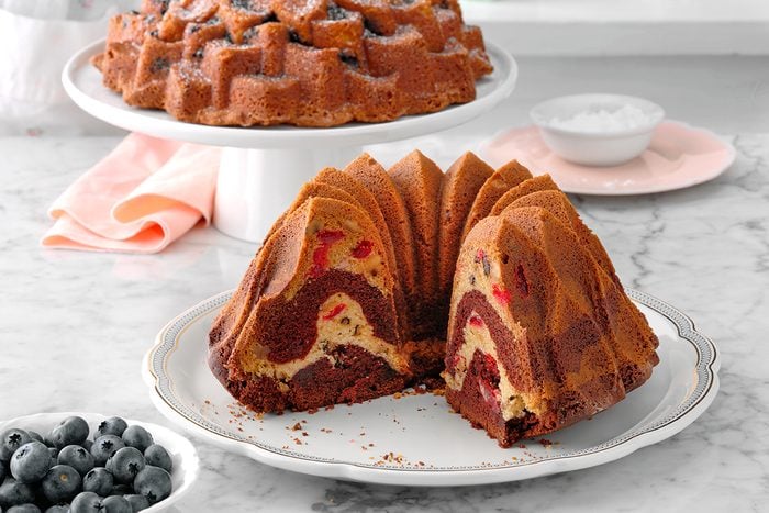 Bundt cakes on marble surface