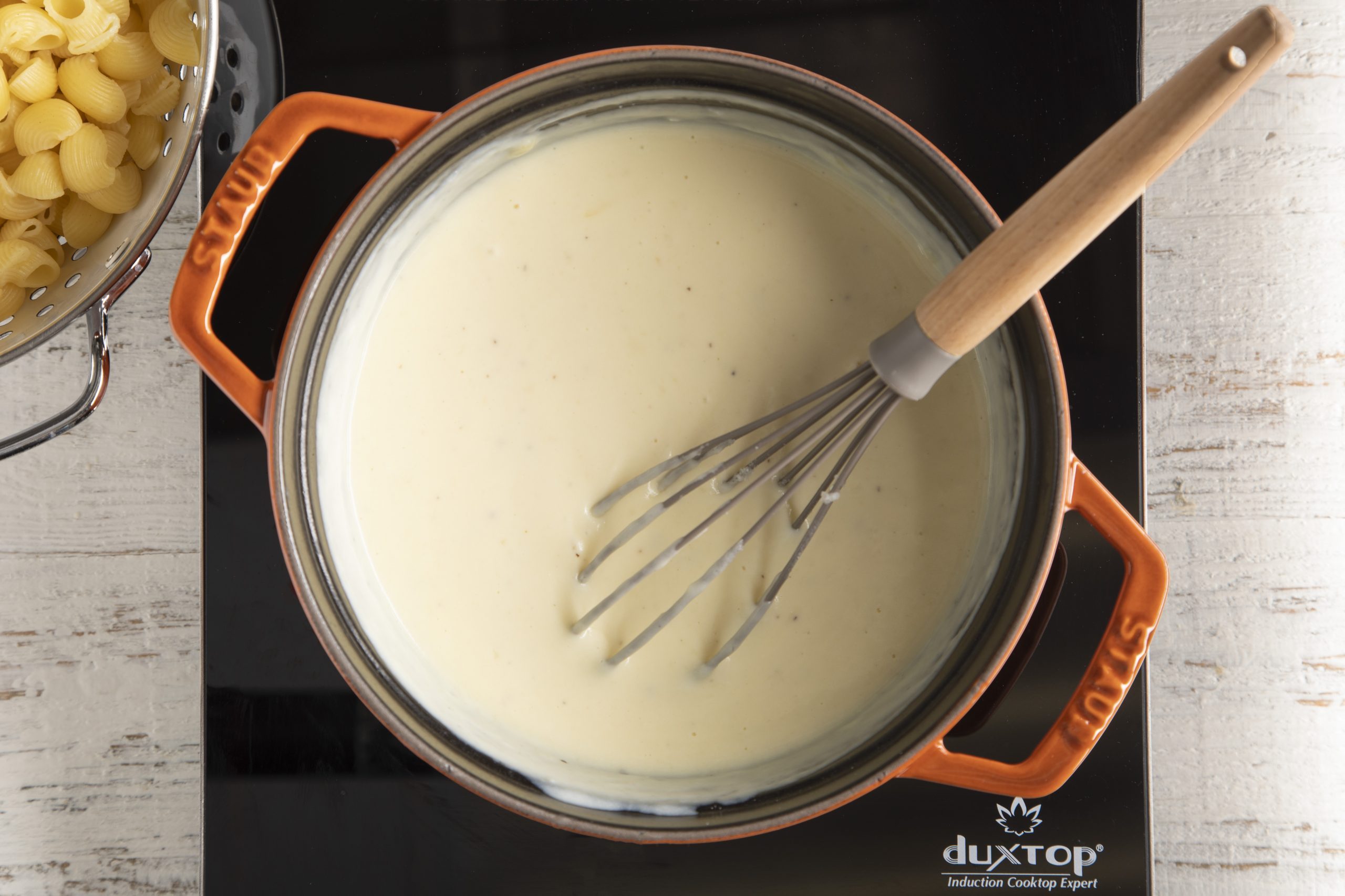 whisk in milk to roux for mac and cheese
