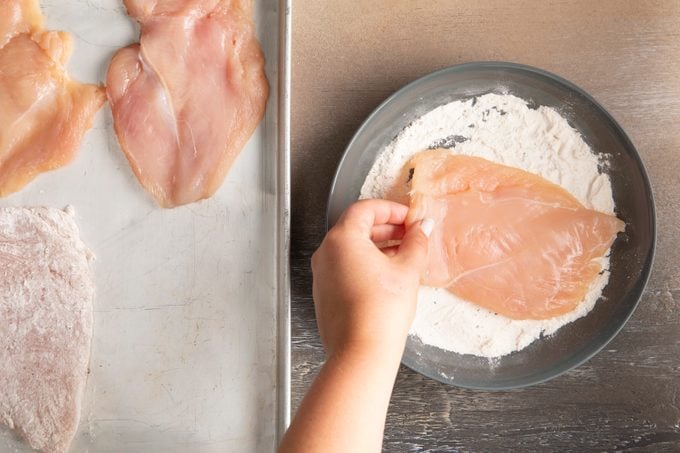 dip the chicken in the flour coating