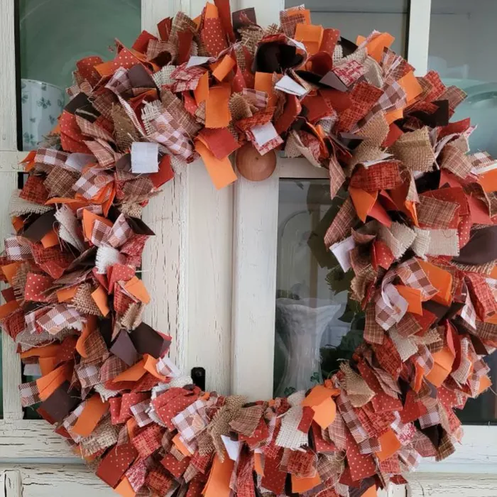 fall wreath made from fabric scraps and burlap